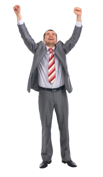 Emocionado hombre de negocios guapo con los brazos levantados en el éxito — Foto de Stock