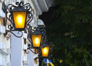 Lighting lanterns of the old city clipart