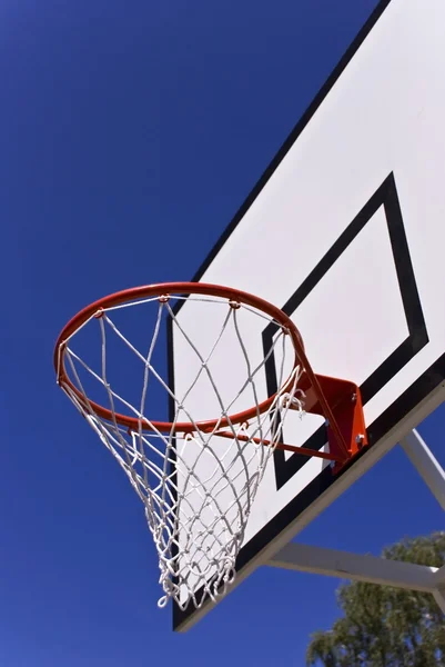 stock image Basketball hoop against blue sky