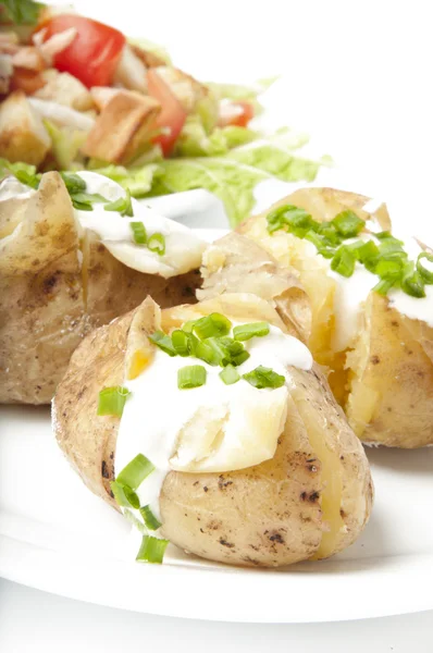 Baked potato and salad — Stock Photo, Image