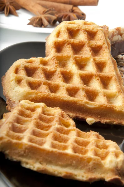 stock image Waffle in heart shape isolated on black