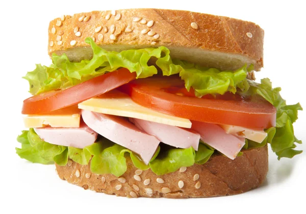 Zdravé šunkový sendvič se sýrem, rajčaty a salátem — Stock fotografie