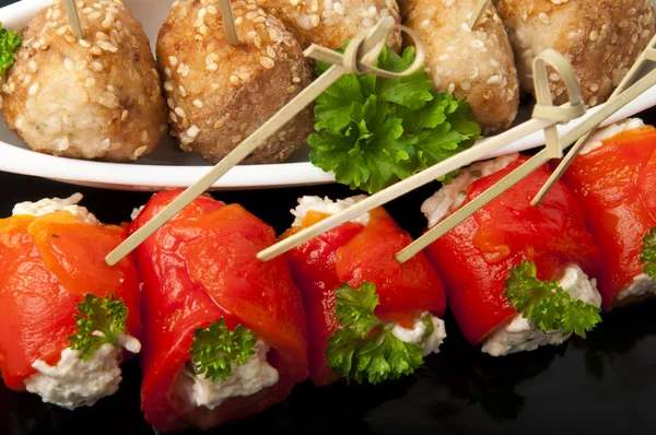 stock image Appetizer meatballs and sweet peppers with cream cheese