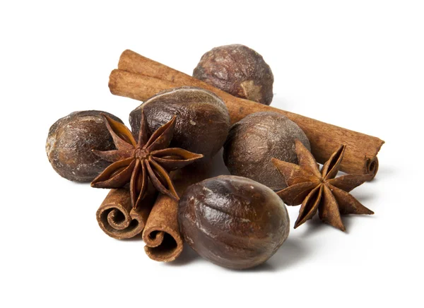 Anise, cinnamon, nutmeg on a white background — Stock Photo, Image
