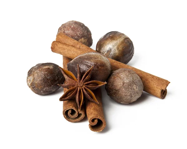 Anise, cinnamon, nutmeg on a white background — Stock Photo, Image