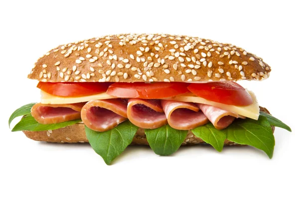 Velký sendvič na bílém pozadí — Stock fotografie