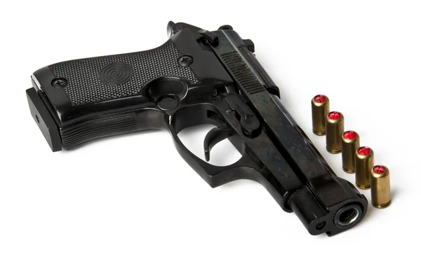 Pistola y balas aisladas sobre fondo blanco —  Fotos de Stock