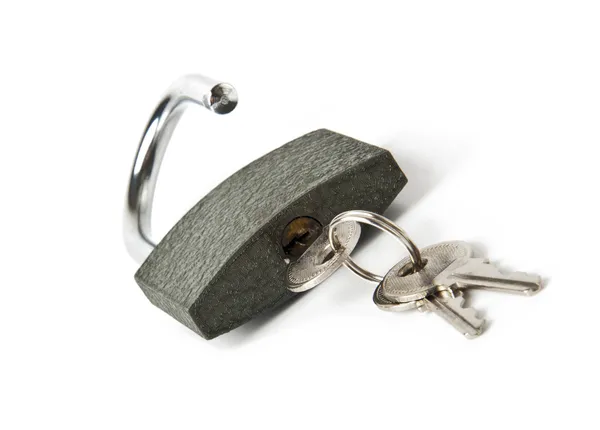Cerradura de llave con un montón de llaves pequeñas —  Fotos de Stock