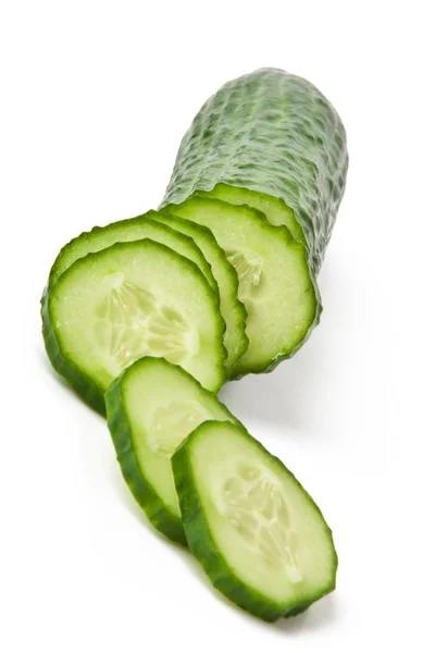 Cucumber and slices isolated over white background. — Stock Photo, Image