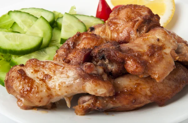 Grilled chicken on a white plate — Stock Photo, Image