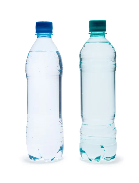 Полікарбонатні пластикові пляшки мінеральної води — стокове фото
