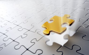 Jigsaw puzzle with a single golden piece