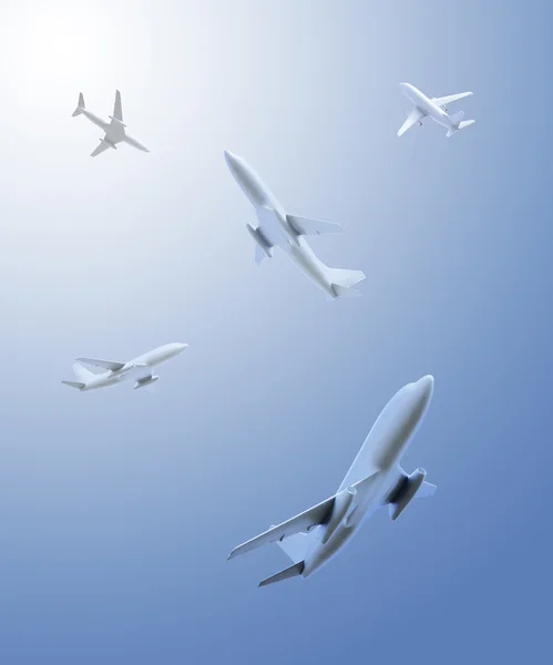 stock image Five airplanes flying in different directions over the viewer