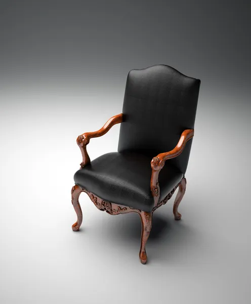 Een leeg zwart lederen fauteuil — Stockfoto