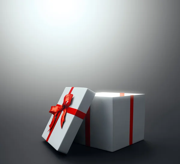 Kırmızı kurdele - yılbaşı kutlama görüntüsü ile beyaz hediye — Stok fotoğraf