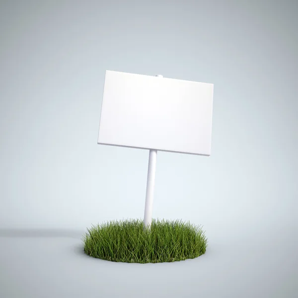 Ein leeres Schild auf einem Stück Gras — Stockfoto