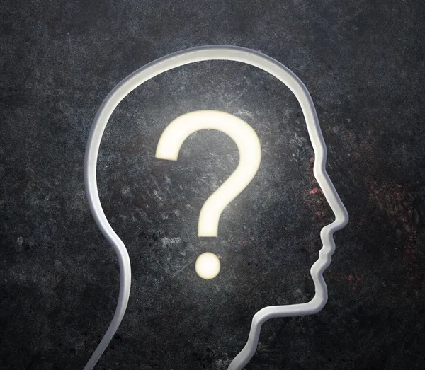 stock image 3D silhouette of a male face with a glowing question mark