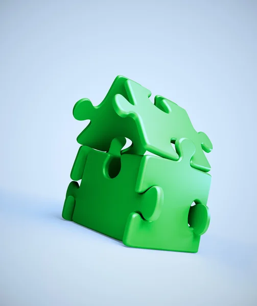 Maison symbole construire à partir de pièces de puzzle — Photo
