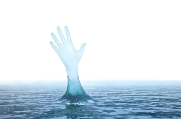 stock image Hand reaching upwards from the water surface.