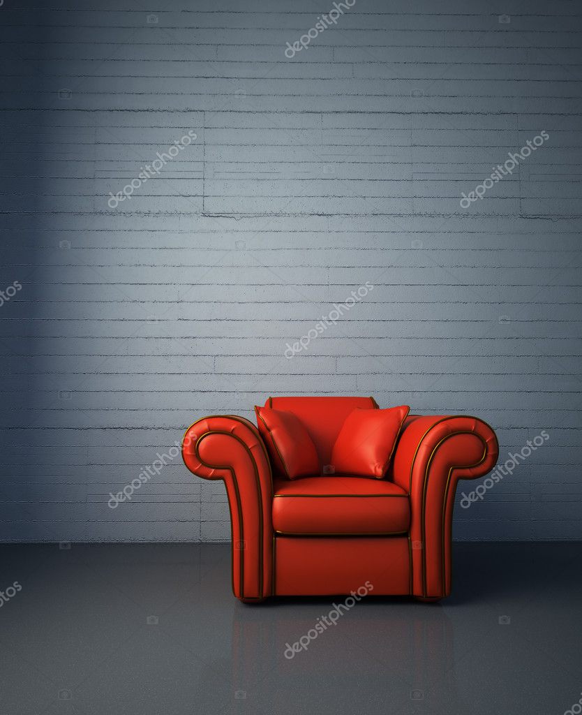 Red leather armchair with a concrete wall in the background. Stock Photo by  ©Mopic 8020131