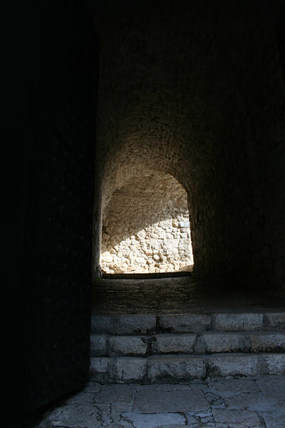 Tunnel with footsteps in the ancient fortress