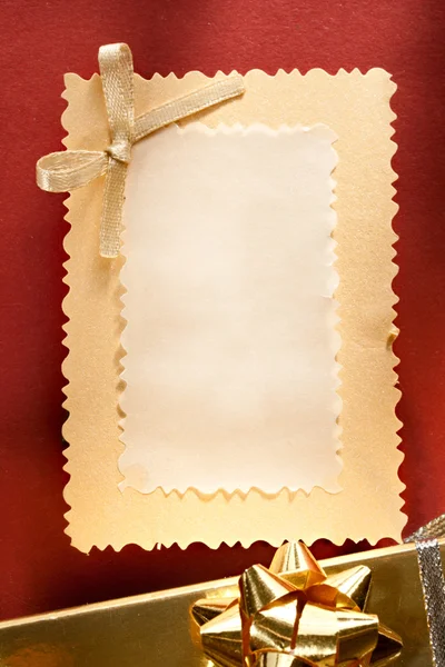 Decorated gift box with a greeting card — Stock Photo, Image