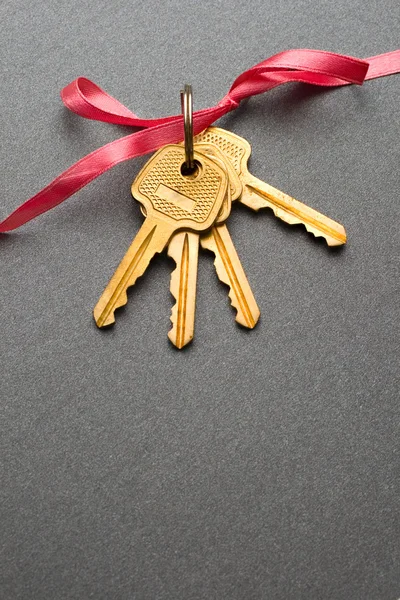 Keys with ribbon — Stock Photo, Image