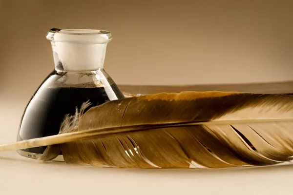 stock image A feather with the bottle full of ink