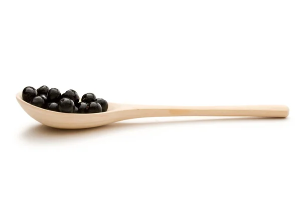Gargantilla negra en una cuchara — Foto de Stock