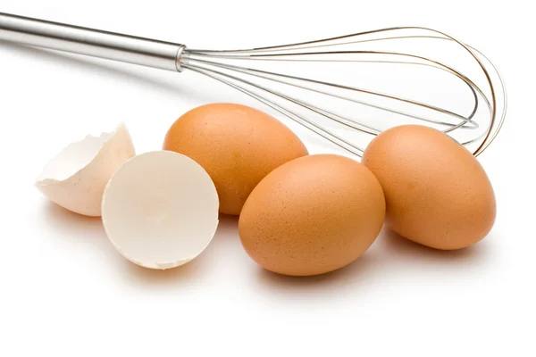 Batidor de huevos y huevos —  Fotos de Stock