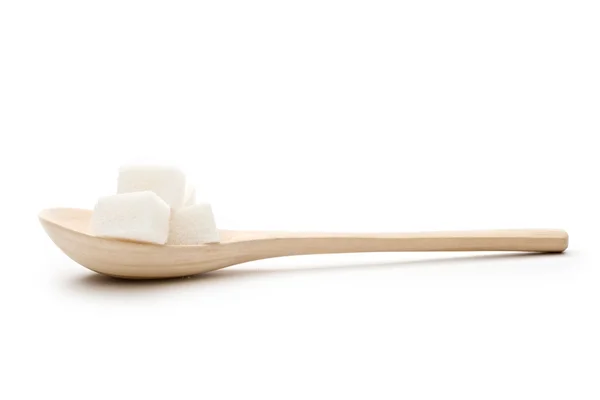 Zucchero in un cucchiaio di legno — Foto Stock