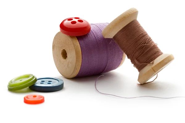 Thread bobbins and buttons — Stock Photo, Image