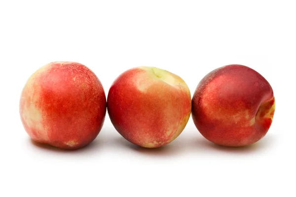 Peaches on the white background — Stock Photo, Image