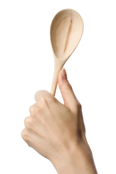 Wooden spoon in the hand — Stock Photo, Image