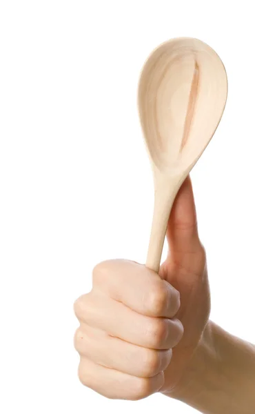 Wooden spoon in the hand — Stock Photo, Image