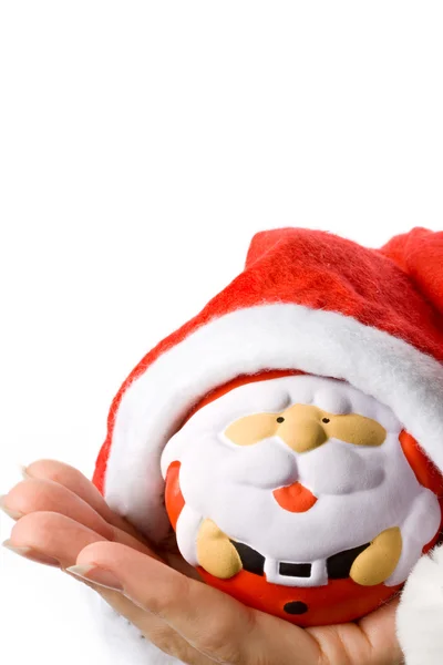 Santa in vrouwelijke handen — Stockfoto