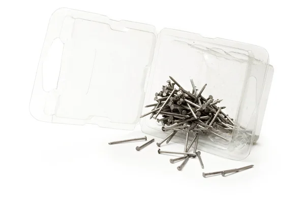 Paznokcie w plastikowe pudełko — Zdjęcie stockowe