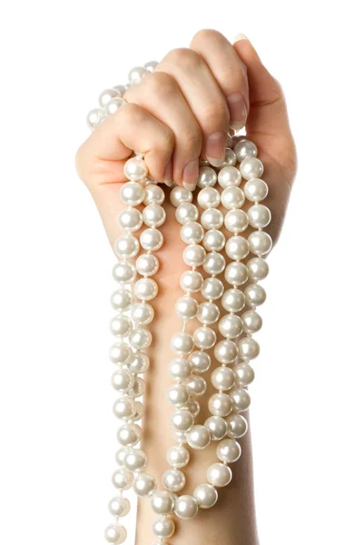 Perle in der Hand der Frau — Stockfoto