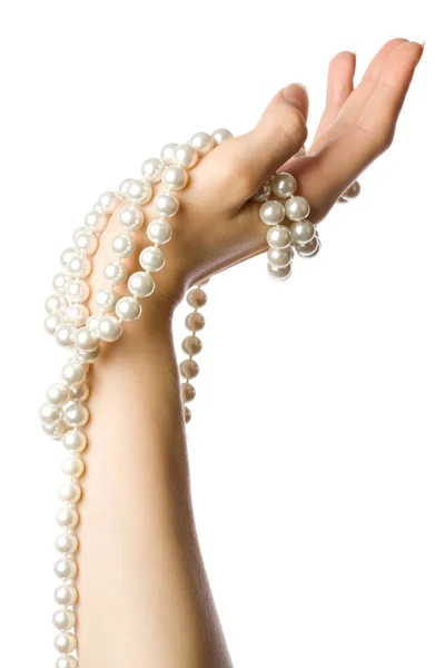 Pearl in woman's hand — Stock Photo, Image