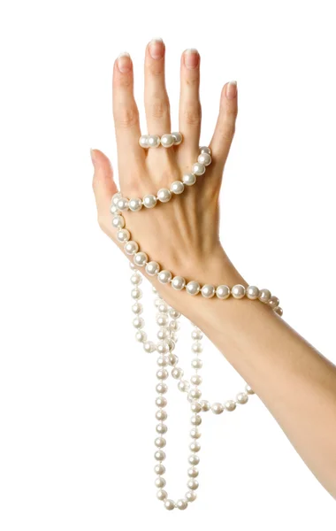 Pearl in woman's hand — Stock Photo, Image