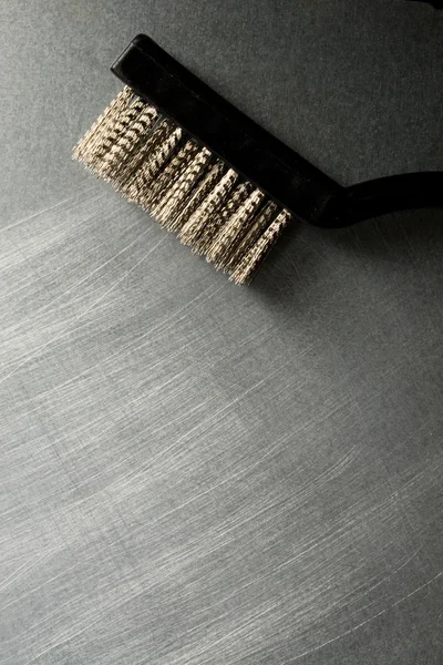 Çelik arka plan üzerinde metal fırça — Stok fotoğraf