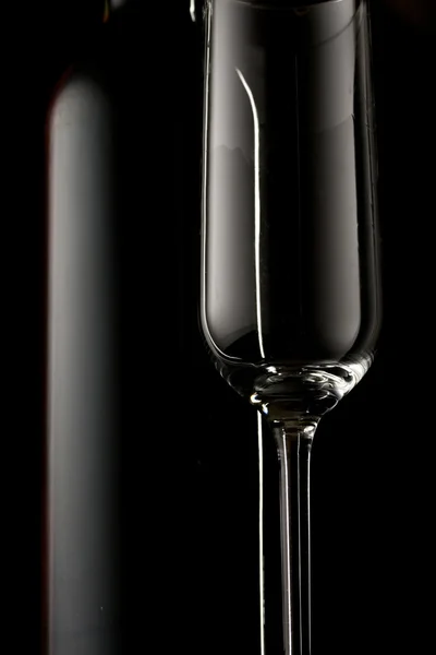 Bouteille de vin et verre vide — Photo