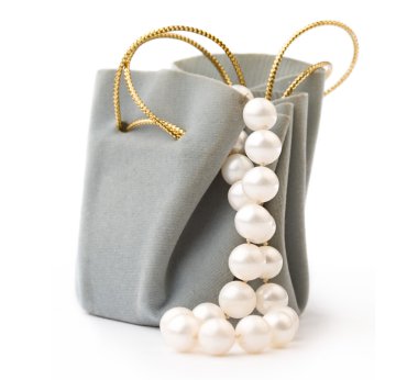 Gift box and pearl on white clipart