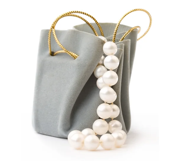 stock image Gift box and pearl on white