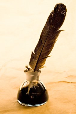 Feather and ink bottle clipart