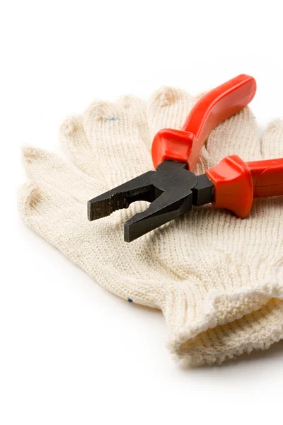 Gloves and pliers — Stock Photo, Image