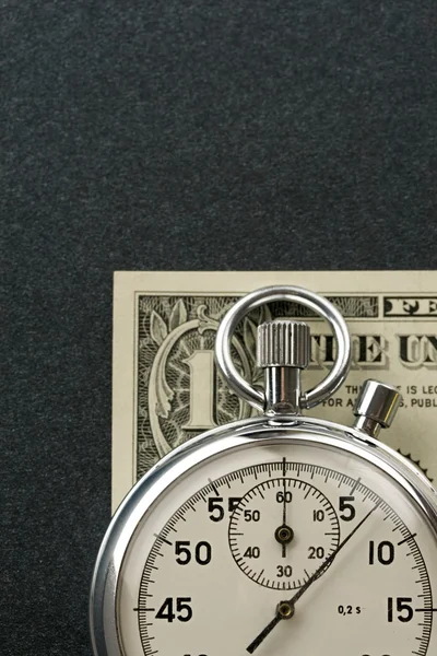 Cronômetro e dólar — Fotografia de Stock