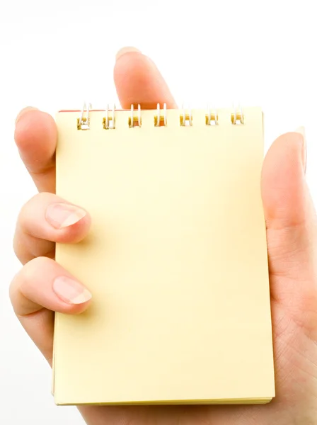 Notepad in a hand — Stock Photo, Image