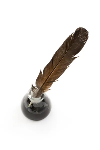 Feather and ink bottle — Stock Photo, Image