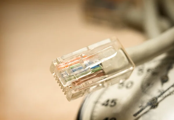 Cable Ethernet y cronómetro —  Fotos de Stock